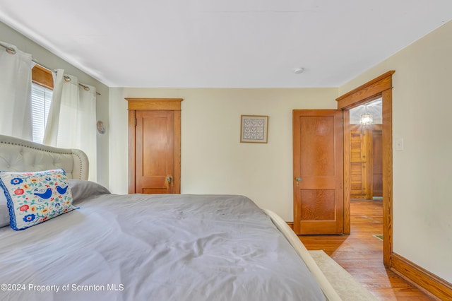 bedroom featuring light wood-type flooring