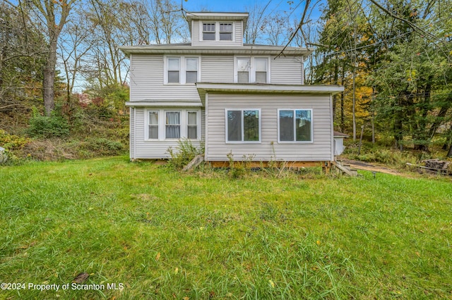 exterior space featuring a front yard