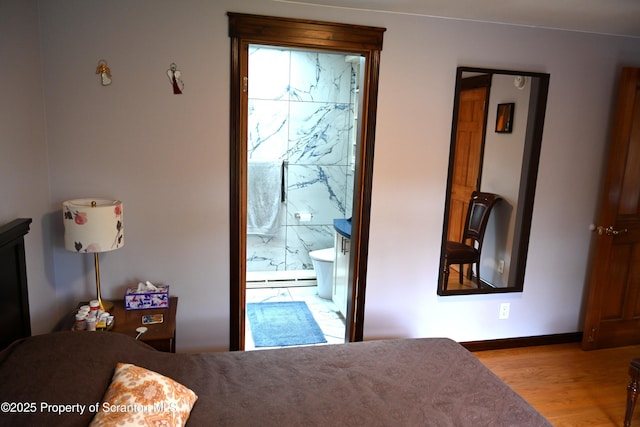 3511 Liberty Park Rd, Hallstead, PA 18822 - bedroom with wood finished floors, connected bathroom, and baseboards