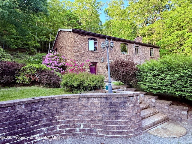 3511 Liberty Park Rd, Hallstead, PA 18822 - view of front of house with a chimney and brick siding
