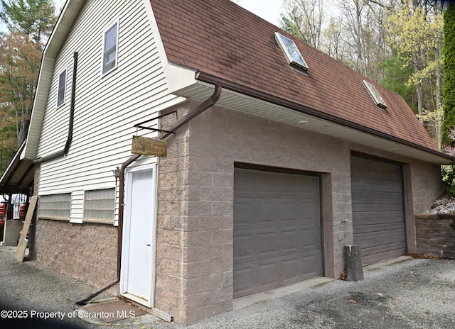 3511 Liberty Park Rd, Hallstead, PA 18822 - view of side of property featuring a shingled roof, an attached garage, driveway, and a gambrel roof