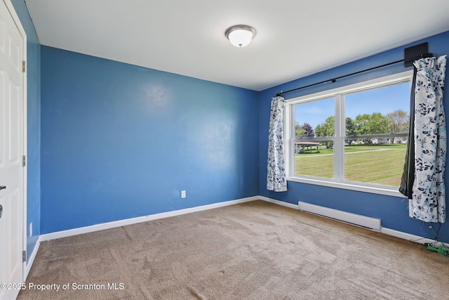 960 Lott Rd, Meshoppen, PA 18630 - unfurnished room with a baseboard heating unit, carpet, and baseboards
