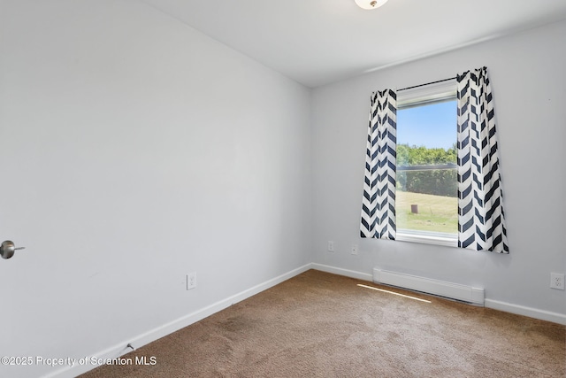 960 Lott Rd, Meshoppen, PA 18630 - carpeted empty room with a baseboard heating unit and baseboards