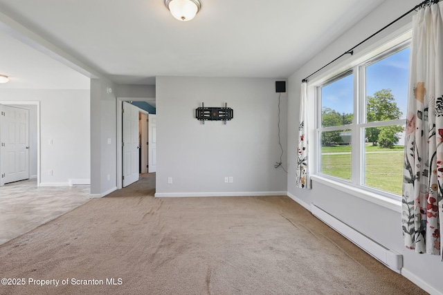 960 Lott Rd, Meshoppen, PA 18630 - empty room featuring a baseboard radiator, carpet flooring, and baseboards
