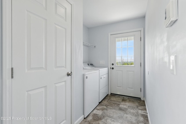 960 Lott Rd, Meshoppen, PA 18630 - laundry area with washer and clothes dryer, stone finish flooring, and baseboards