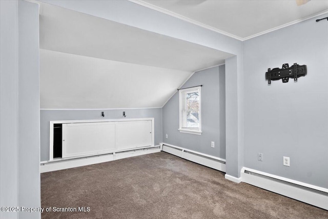 bonus room featuring baseboard heating, carpet floors, and vaulted ceiling