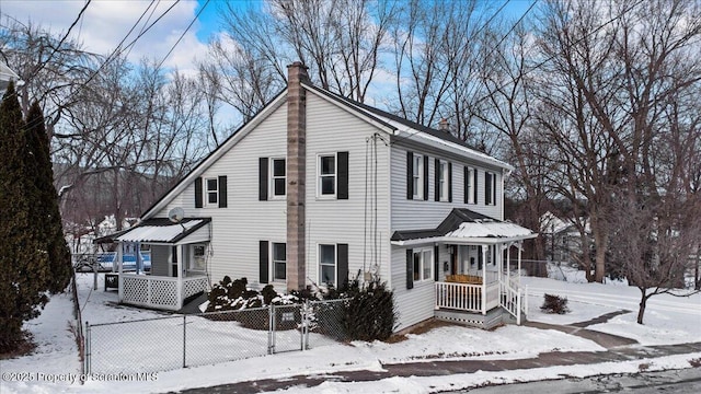 view of snow covered property