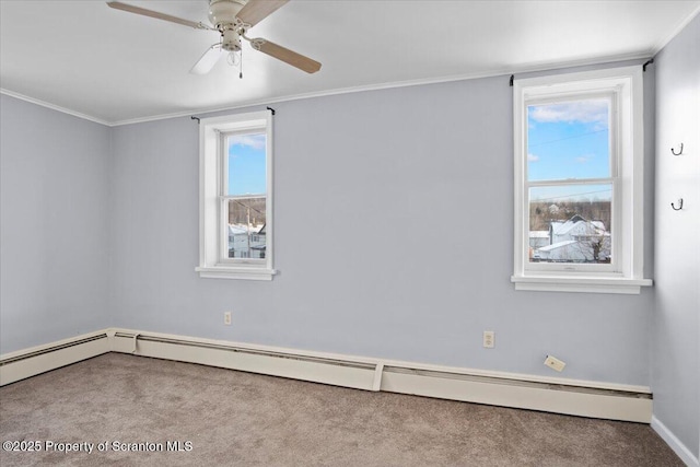 carpeted empty room featuring a wealth of natural light, a baseboard heating unit, and crown molding