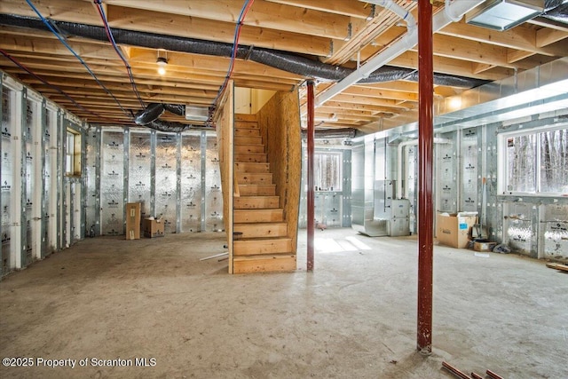 basement featuring plenty of natural light