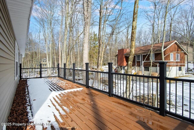 view of snow covered deck