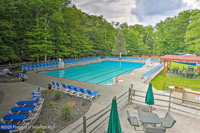 view of pool featuring a gazebo and a patio