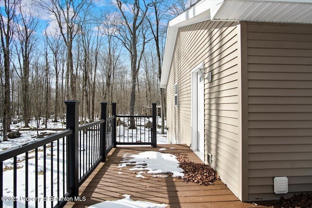 view of snow covered deck