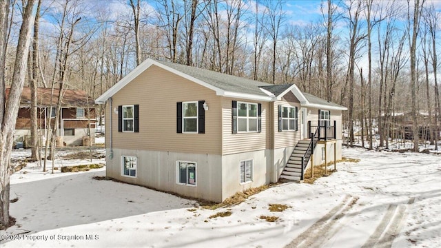 view of snow covered property