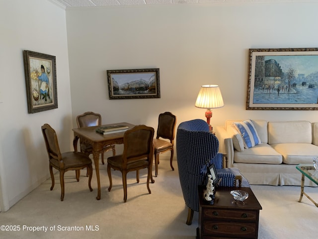 view of carpeted dining area