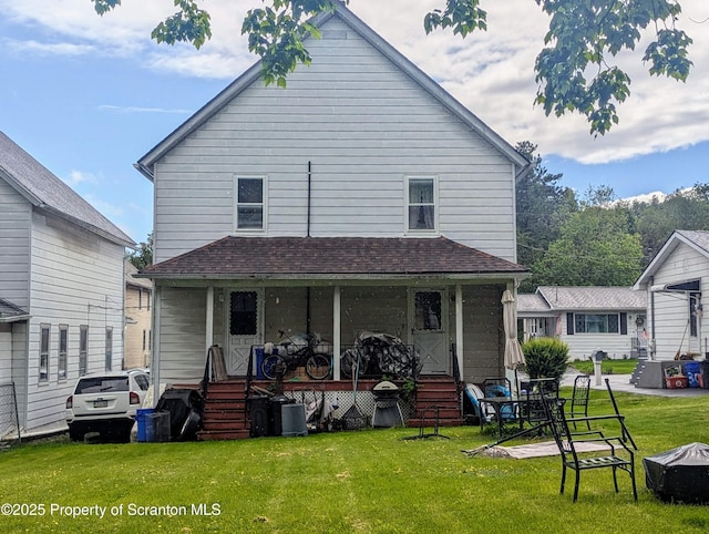 26-28 Glinko St, Scranton, PA 18504 - back of house with a porch, a yard, and a shingled roof