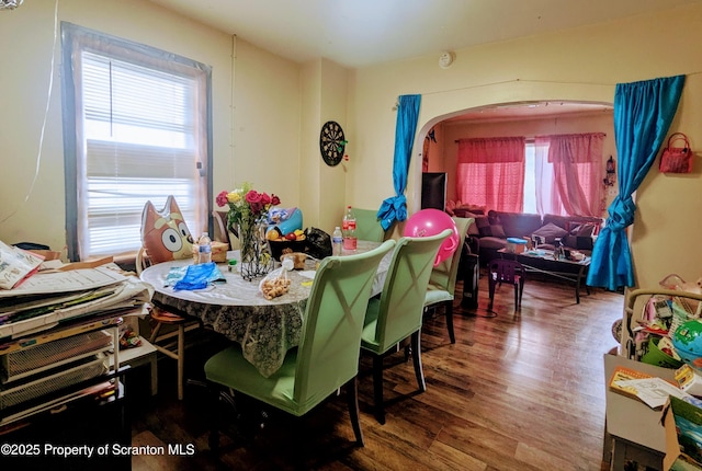 26-28 Glinko St, Scranton, PA 18504 - dining area featuring wood finished floors, healthy amount of natural light, and arched walkways