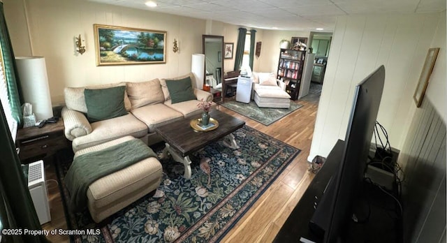 26-28 Glinko St, Scranton, PA 18504 - living room featuring wood finished floors and a decorative wall