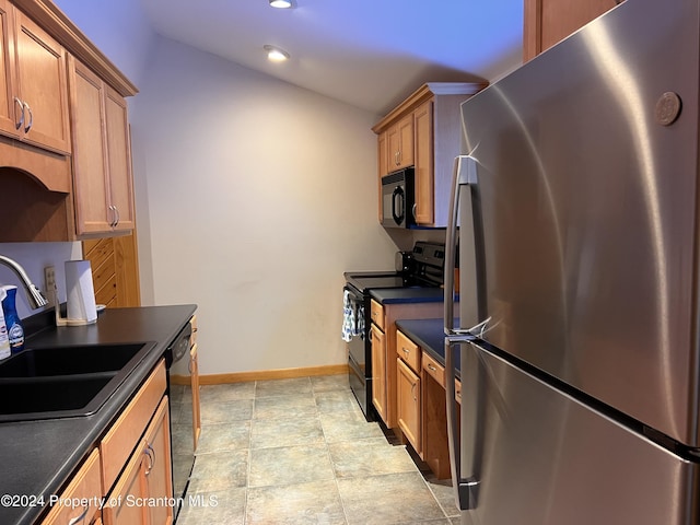 kitchen featuring sink and black appliances