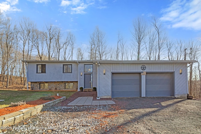 garage with driveway