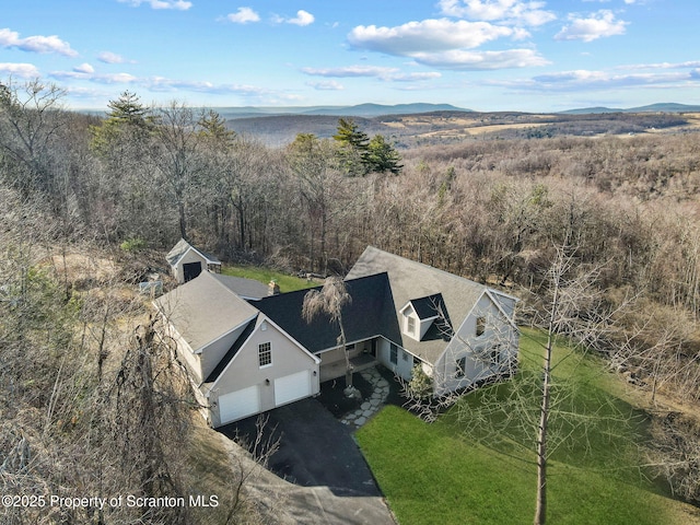 drone / aerial view featuring a mountain view