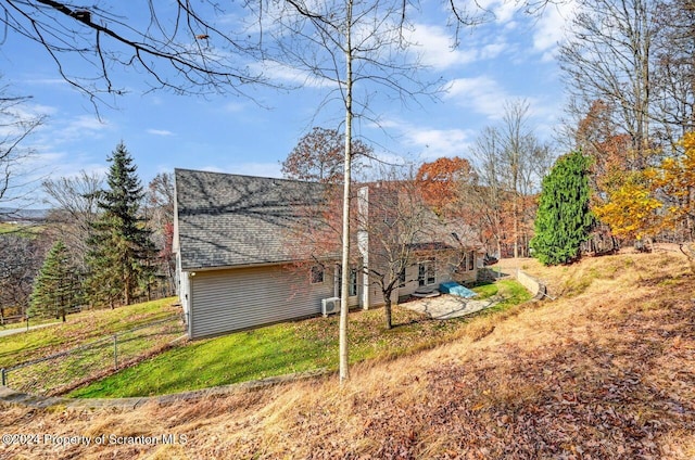 view of home's exterior featuring a lawn