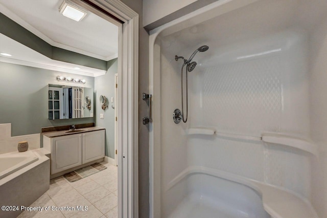 bathroom featuring tile patterned floors, vanity, separate shower and tub, and ornamental molding