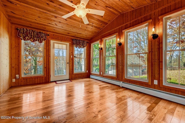 unfurnished sunroom with ceiling fan, a baseboard radiator, wood ceiling, and lofted ceiling