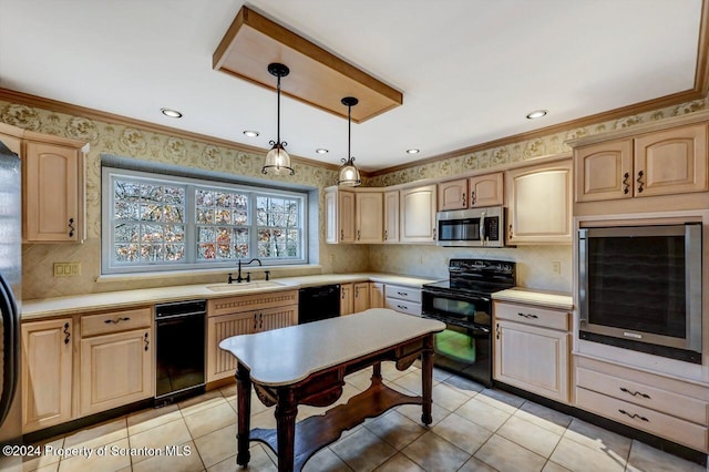 kitchen with light brown cabinets, black appliances, decorative light fixtures, and sink