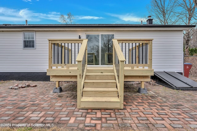 rear view of property with a deck