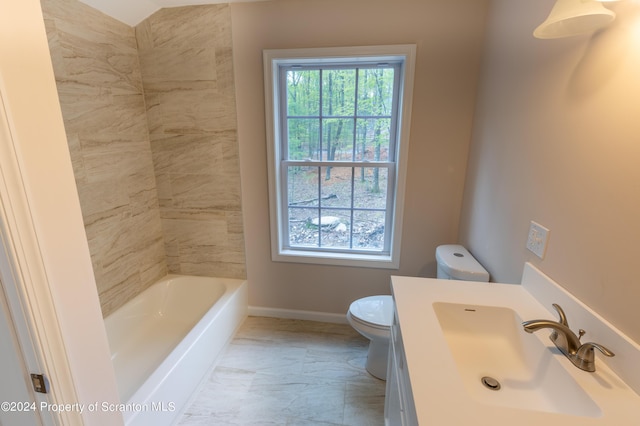 bathroom with toilet, a wealth of natural light, a tub, and sink