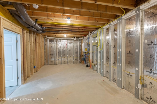 basement featuring water heater