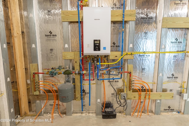 utility room with water heater