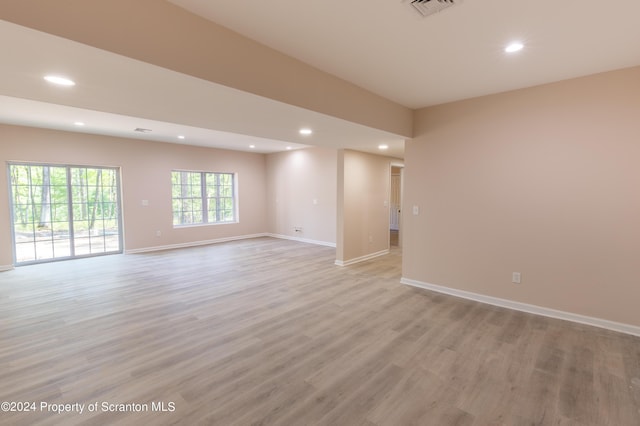 spare room with light wood-type flooring