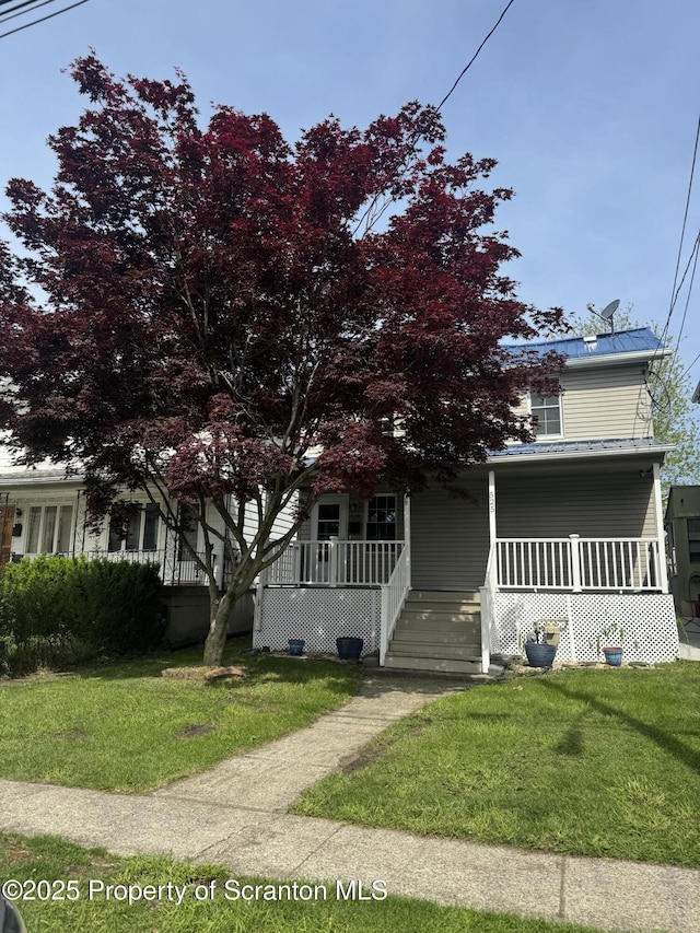 525 N Hyde Park Ave, Scranton, PA 18504 - view of front of property featuring a porch and a front yard