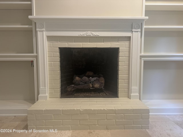 interior details with a fireplace