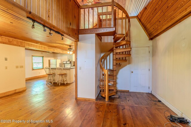 2269 Creek Rd, New Milford, PA 18834 - stairs with hardwood / wood-style flooring, ceiling fan, and baseboards
