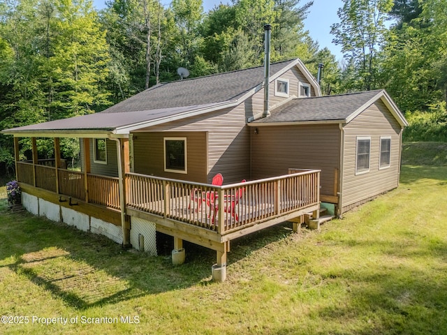 2269 Creek Rd, New Milford, PA 18834 - back of house featuring a wooden deck, a yard, and roof with shingles