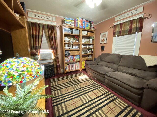 906 Cedar Ave, Scranton, PA 18505 - living room featuring crown molding, a ceiling fan, cooling unit, and wood finished floors