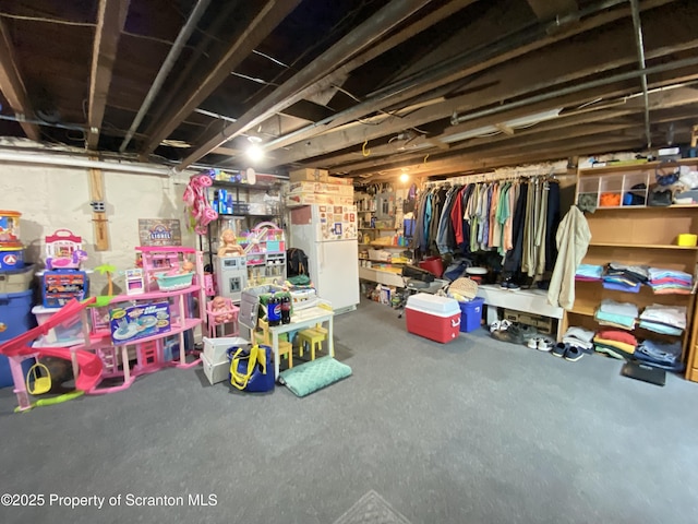 906 Cedar Ave, Scranton, PA 18505 - unfinished basement featuring freestanding refrigerator