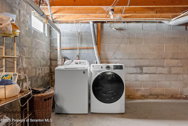 laundry area with laundry area and separate washer and dryer