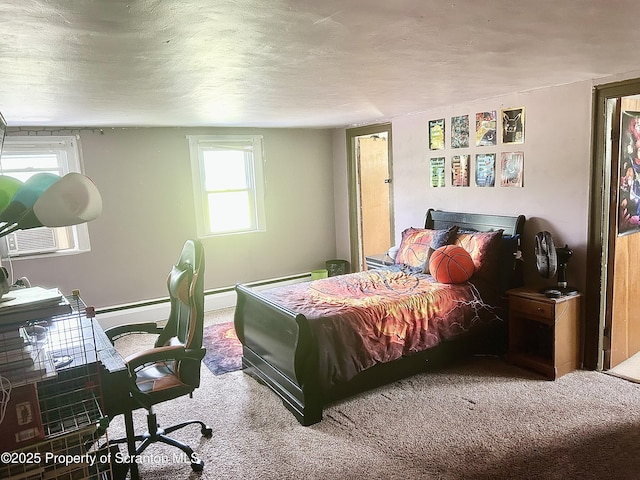 carpeted bedroom with cooling unit and a baseboard heating unit