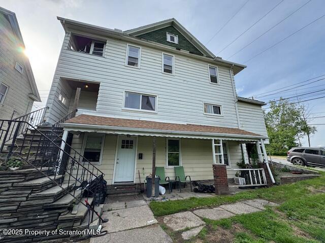 1449 Dickens St, Scranton, PA 18504 - multi unit property with a porch and stairway