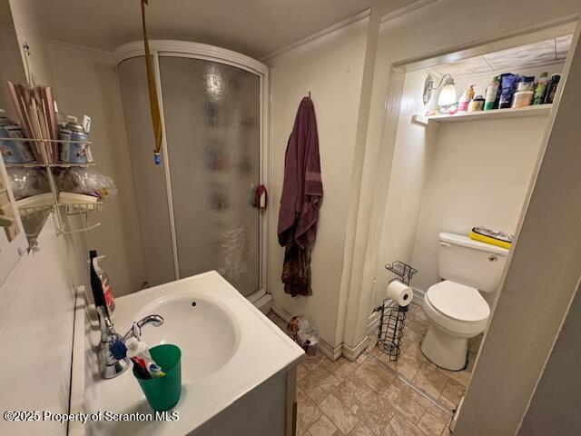 1449 Dickens St, Scranton, PA 18504 - bathroom with a stall shower, toilet, and vanity