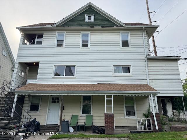 1449 Dickens St, Scranton, PA 18504 - rear view of property with a porch and stairs