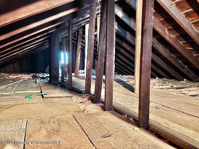 view of unfinished attic