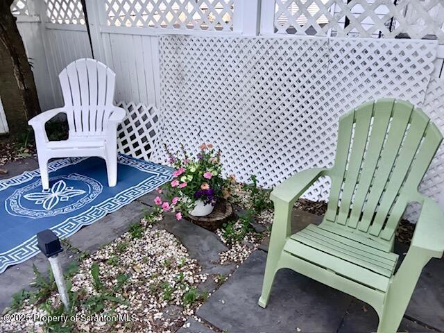 view of patio / terrace with fence