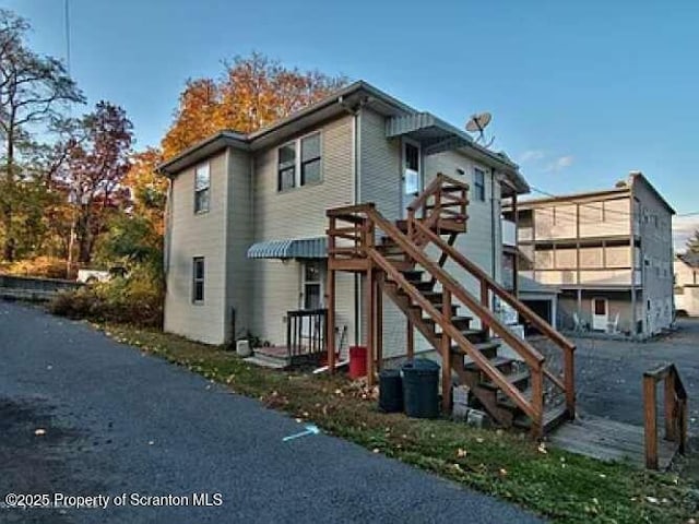 116 Cherry St, Dunmore, PA 18512 - back of property featuring stairs