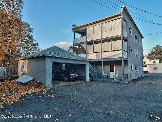 116 Cherry St, Dunmore, PA 18512 - back of house with asphalt driveway
