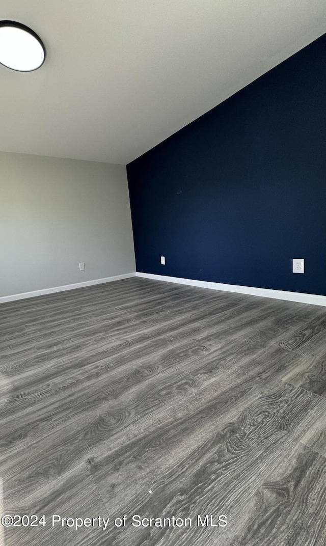 empty room featuring dark hardwood / wood-style floors