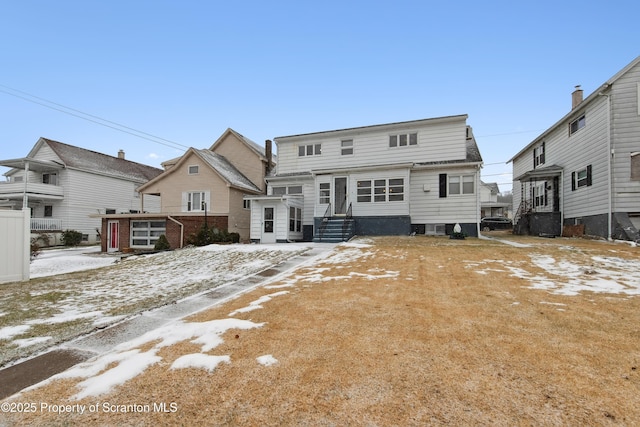 view of snow covered property